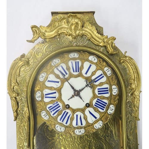 2224 - A LARGE FRENCH BRASS TIMEPIECEof Rococo style, the dial with white markers with blue roman numeral d... 