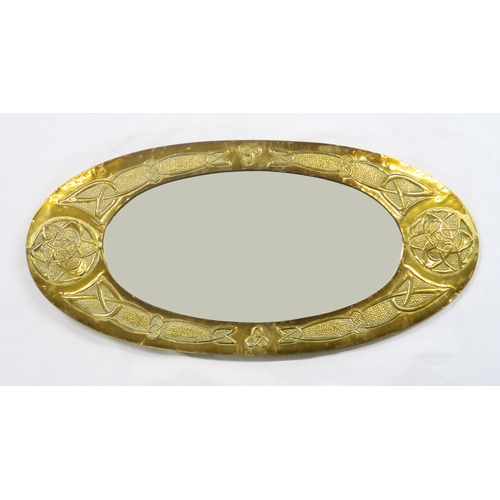 2225 - A GLASGOW SCHOOL CELTIC REVIVAL WALL MIRROR of oval form with knotwork decoration, 85cm long... 