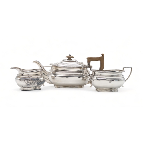 2454 - A GEORGE VI THREE PIECE SILVER TEA SERVICEby Edward & Sons, Sheffield 1937, of shaped rectangula... 