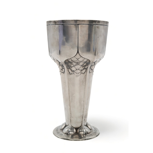 2456 - ORIVIT;A German silver Jugendstil vase, of flaring conical form, with stylised fruit decoration with... 