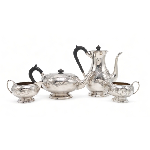 2485 - A CANADIAN FOUR PIECE SILVER TEA SERVICEby Birks, 1933, of baluster form, with engraved scrolling fo... 