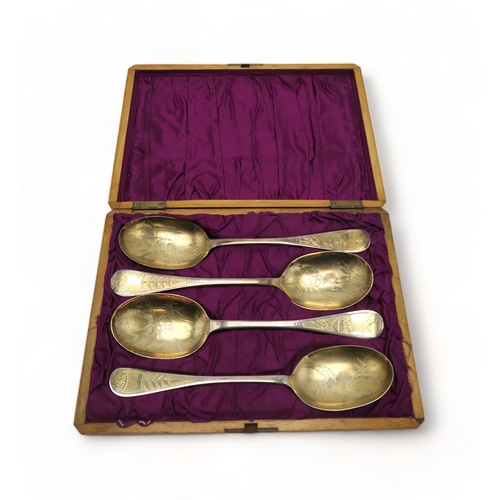 2498 - A CASED SET OF GEORGE III SILVER GILT SERVING SPOONSby Charles Mash, Dublin 1821, with an additional... 