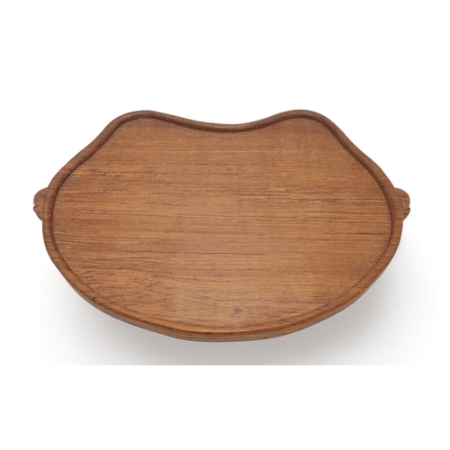 2200 - ROBERT MOUSEMAN THOMPSON (1876-1955)An oak kidney shaped tea tray, with twin carved mouse signature ... 