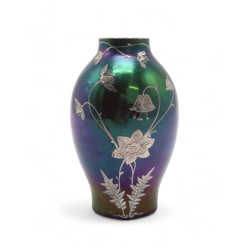 2214 - A LOETZ STYLE VASEof iridescent green over purple glass, overlaid with silver in the form of flowers... 