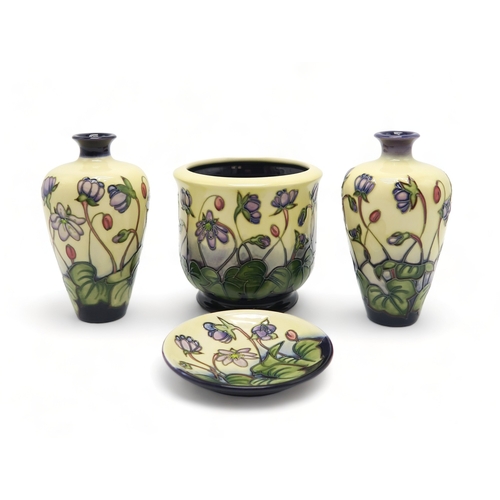 2228 - A PAIR OF MOORCROFT HEPATICA PATTERN VASESof tapering form, 15.5cm high together with a small jardin... 