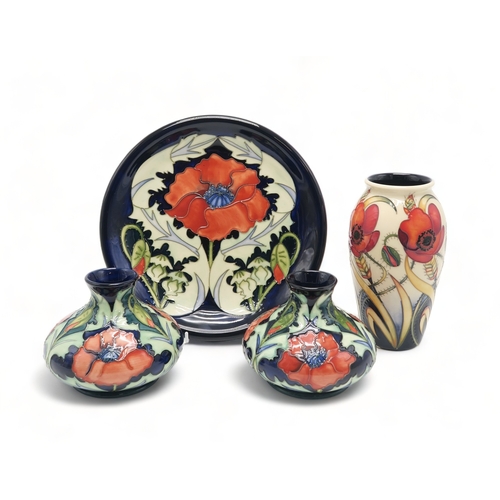 2230 - A PAIR OF MOORCROFT WILLIAM MORRIS POPPY PATTERN VASESof squat baluster form, each 11cm high, togeth... 