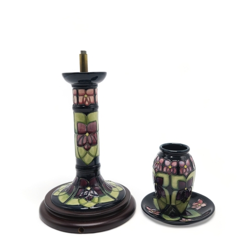 2234 - THREE PIECES OF MOORCROFT VIOLET PATTERN CERAMICSincluding a table lamp, a vase 11cm high and a coas... 