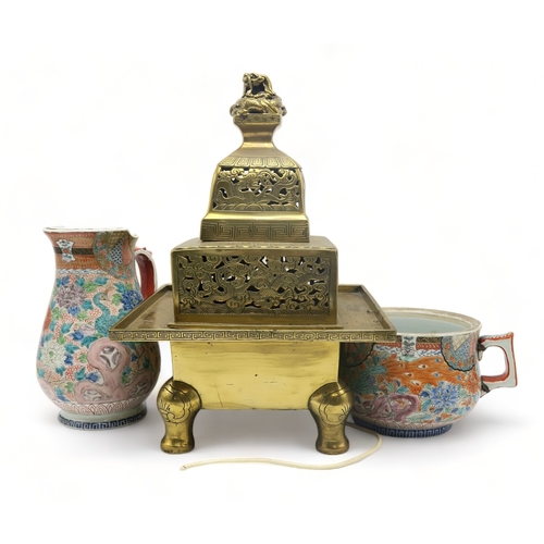 2378 - A LARGE CHINESE BRASS TEMPLE CENSER With dragon finial above pierced dragon friezes, 47cm high and a... 