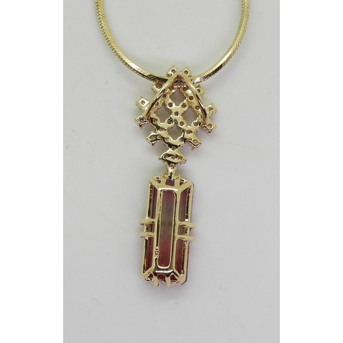 2738 - WATERMELON TOURMALINE & DIAMOND PENDANTset with a pink and green emerald cut tourmaline gemstone... 