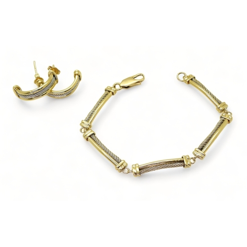 2741 - AN ARABIC GOLD SETcomprising of bracelet and earrings with white gold cable pattern details. Length ... 