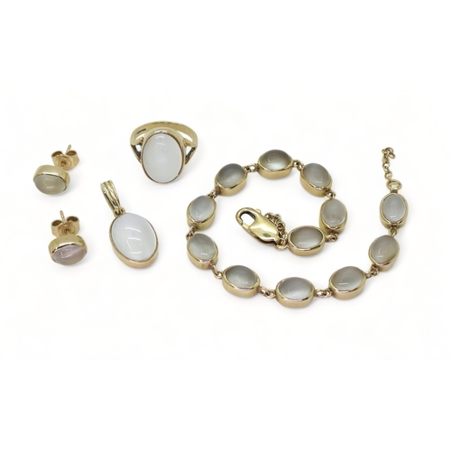 2742 - A SET OF 9CT MOONSTONE JEWELScomprising of ring, size I1/2 (I for India), stud earrings, a pendant a... 