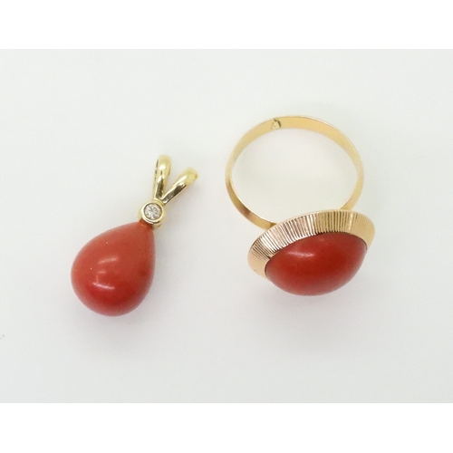 2745 - AN 18CT GOLD CORAL PENDANT AND RING,the tear drop shaped pendant is set with a 0.05ct brilliant cut ... 