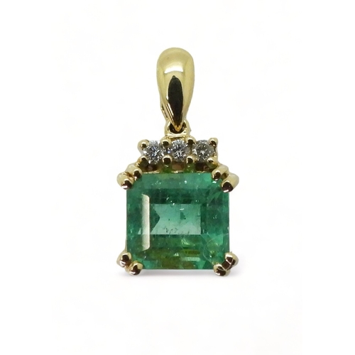 2751 - AN EMERALD AND DIAMOND PENDANTset in 18ct gold, set with a step cut emerald of approx 6.8mm x 6.4mm,... 