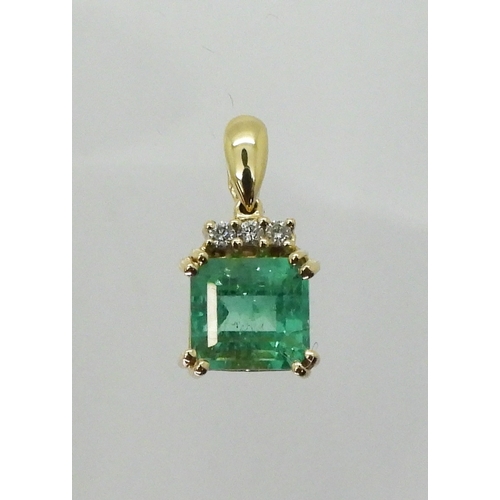 2751 - AN EMERALD AND DIAMOND PENDANTset in 18ct gold, set with a step cut emerald of approx 6.8mm x 6.4mm,... 