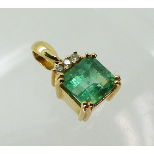 2751 - AN EMERALD AND DIAMOND PENDANTset in 18ct gold, set with a step cut emerald of approx 6.8mm x 6.4mm,... 