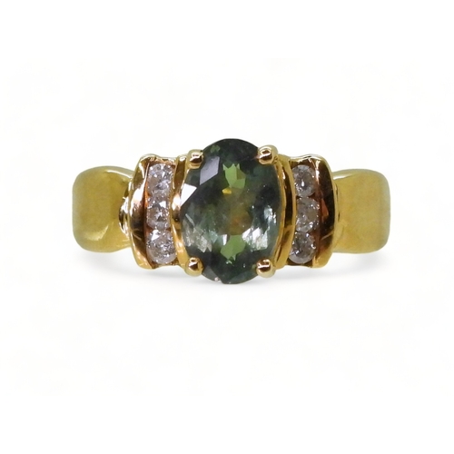 2756 - AN ALEXANDRITE AND DIAMOND RINGset in 18ct yellow gold the ring retailed by GemsTV is set with a 8mm... 