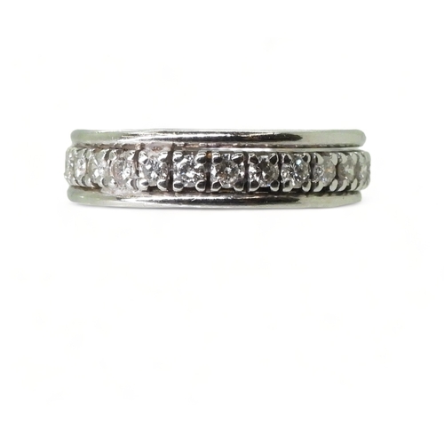 2761 - A DIAMOND FULL ETERNITY RINGstamped with the French eagle's head hallmark for 18ct white gold. Set w... 