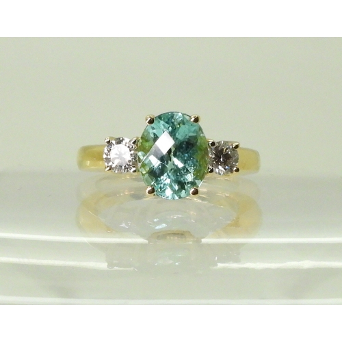 2762 - AN APATITE AND DIAMOND RINGset with a checkerboard cut apatite of 9.7mm x 7.9mm, in the classic... 