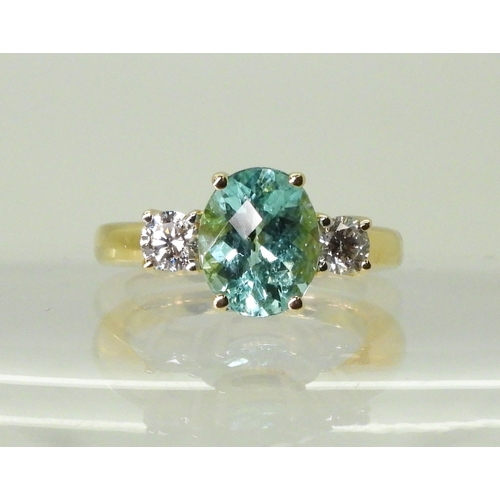 2762 - AN APATITE AND DIAMOND RINGset with a checkerboard cut apatite of 9.7mm x 7.9mm, in the classic... 