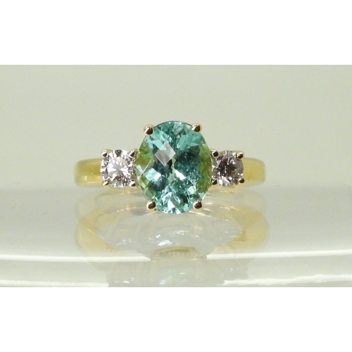 2762 - AN APATITE AND DIAMOND RINGset with a checkerboard cut apatite of 9.7mm x 7.9mm, in the classic... 