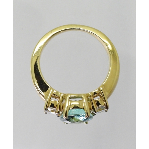 2762 - AN APATITE AND DIAMOND RINGset with a checkerboard cut apatite of 9.7mm x 7.9mm, in the classic... 