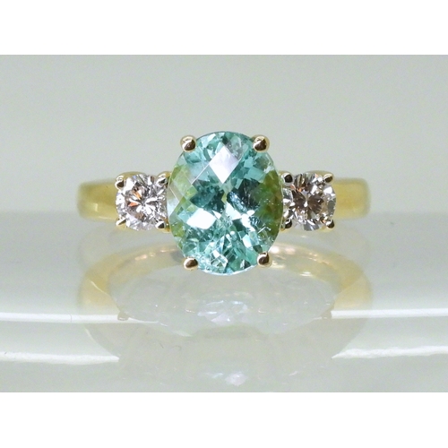 2762 - AN APATITE AND DIAMOND RINGset with a checkerboard cut apatite of 9.7mm x 7.9mm, in the classic... 