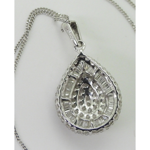 2764 - A DIAMOND PENDANTthe 9ct white gold pear shaped pendant is set with pave and channel set brilliant a... 