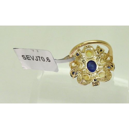 2767 - A FLOWER STATEMENT RINGset with sapphires, Ethiopian opals and white zircons, mounted in 9ct gold. D... 