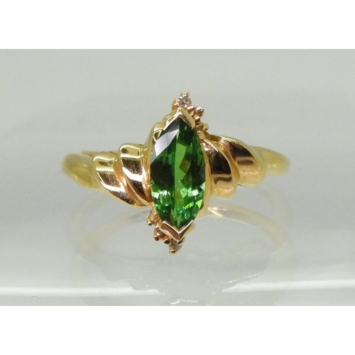 2768 - A TSAVORITE & DIAMOND RINGmounted in 18ct gold, made by GemsTV, set with a marquis cut tsavorite... 