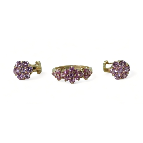 2769 - PINK SAPPHIRE FLOWER SUITEcomprising of a 9ct gold ring, finger size K, with a pair of similar earri... 