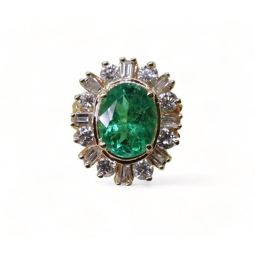 2770 - AN 18CT EMERALD & DIAMOND RINGset with an oval cut emerald of 7mm x 5.6mm, with brilliant and ba... 