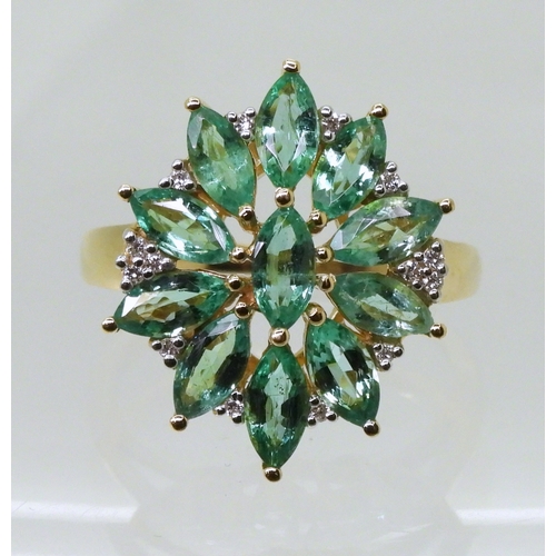 2771 - AN EMERALD & DIAMOND STATEMENT RINGfrom the GemsTV premier brand Iliana collection. Mounted in 1... 