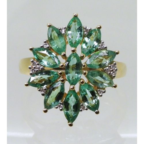 2771 - AN EMERALD & DIAMOND STATEMENT RINGfrom the GemsTV premier brand Iliana collection. Mounted in 1... 