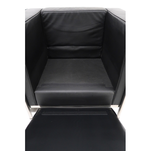 2100 - A PAIR OF 20TH CENTURY AFTER LE CORBUSIER ARMCHAIRSwith black vinyl cushions on chromed tubular fram... 