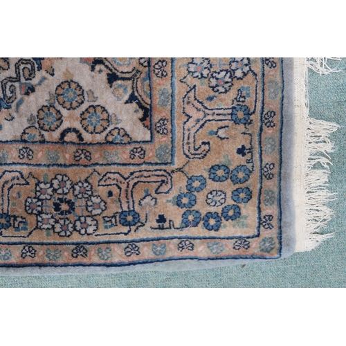 2136 - A GREEN GROUND QASHQAI RUG with all over geometric lozenge patterned ground within geometric fl... 