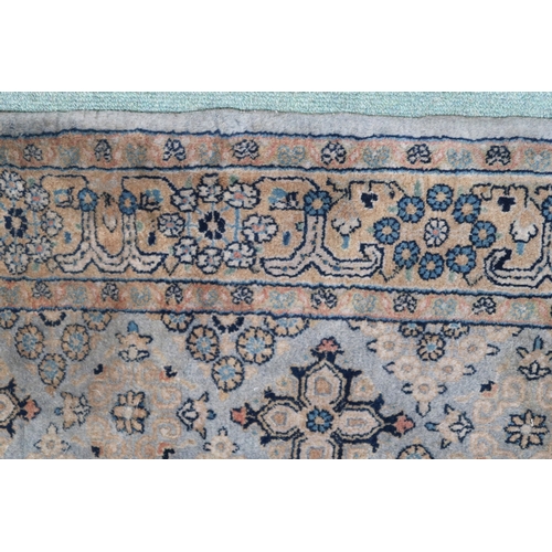 2136 - A GREEN GROUND QASHQAI RUG with all over geometric lozenge patterned ground within geometric fl... 