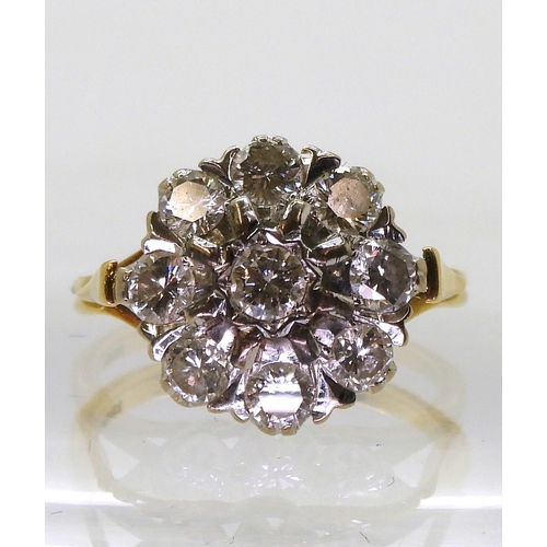 776 - An 18ct gold and diamond cluster ring set with estimated approx 1.35cts of brilliant cut diamonds, f... 