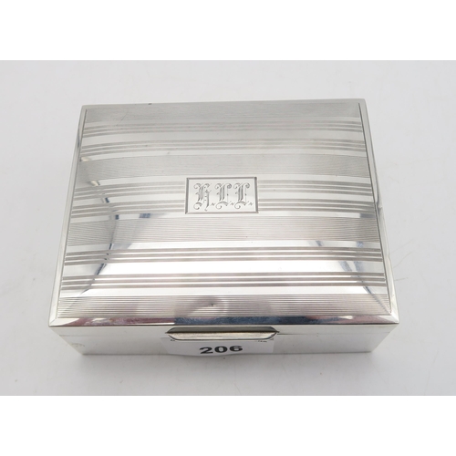 206 - A Goerge V silver cigarette box, by William Hair Haseler, Birmingham 1933, the lid with engine-turne... 