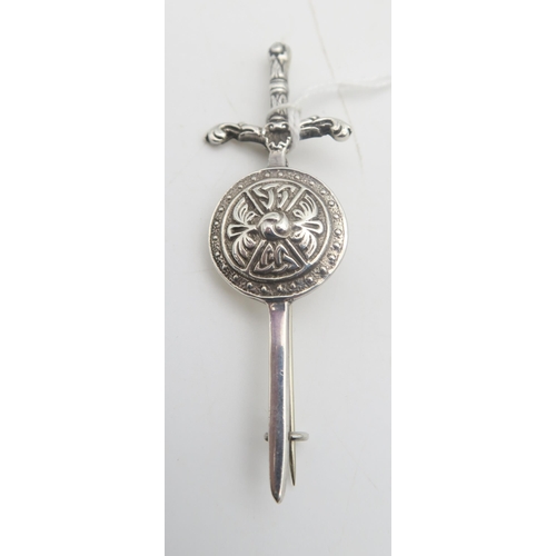 210 - A silver sword and shield brooch, by Robert Allison, and a cased set of Scottish silver coffee spoon... 