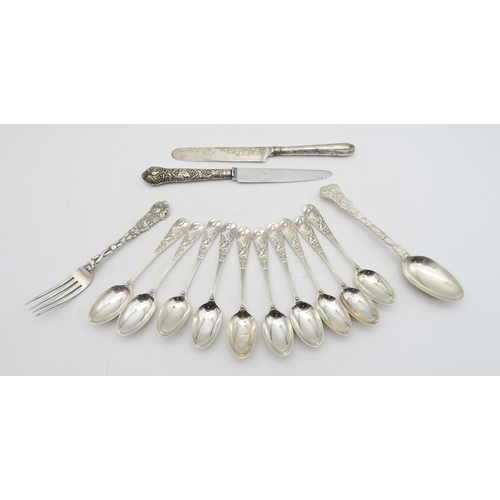 217 - A set of ten Victorian silver tea spoons, by George Adam, London 1881, decorated in the aesthetic st... 