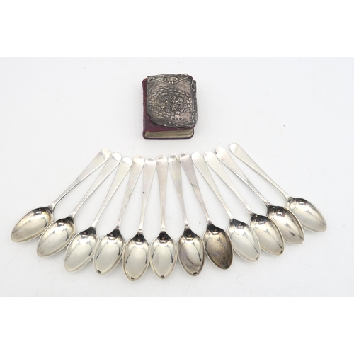 220 - A set of silver teaspoons, by Cooper Brothers & Sons, Sheffield, and a silver-covered miniature ... 