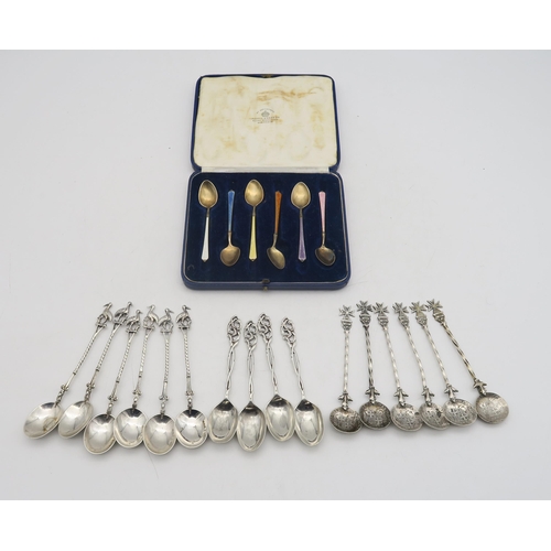 229 - A cased set of harlequin guilloche enamel silver spoons, marked 925, a set of Dutch silver spoons, t... 