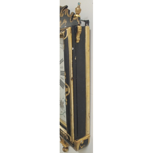 2036 - A 19TH CENTURY BLACK AND GILT PAINTED MALTESE WALL CLOCK scrolled surmount with turned gilt finials ... 