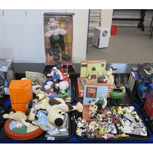 110B - A collection of Wallace and Gromit collectors items including figures, a clock, toastrack etc