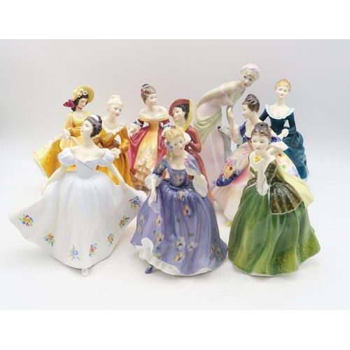 114 - A group of Doulton ladies including Devotion etc