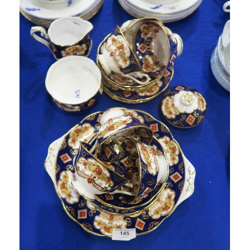 145 - A Royal Albert Heirloom pattern teaset comprising six trios, milk jug, sugar bowl and teapot lid onl... 