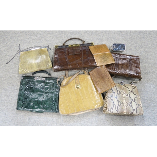 155 - A collection of snakeskin and crocodile skin handbags etc