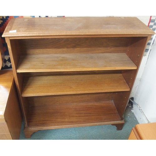 65 - A 20th century teak open bookcase, 102cm high x 92cm wide x27cm deep