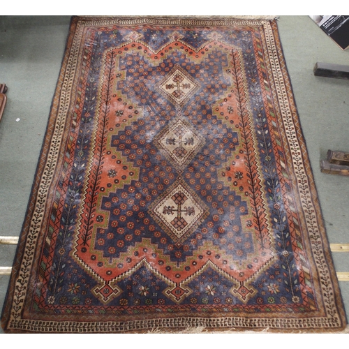 70 - A lot comprising terracotta ground Persian style rug with multicoloured central medallion, matching ... 