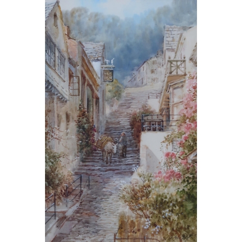 915 - WALTER HENRY SWEET (BRITISH 1889-1943) CLOVELLY, HIGH STREET Watercolour, signed lower rig... 